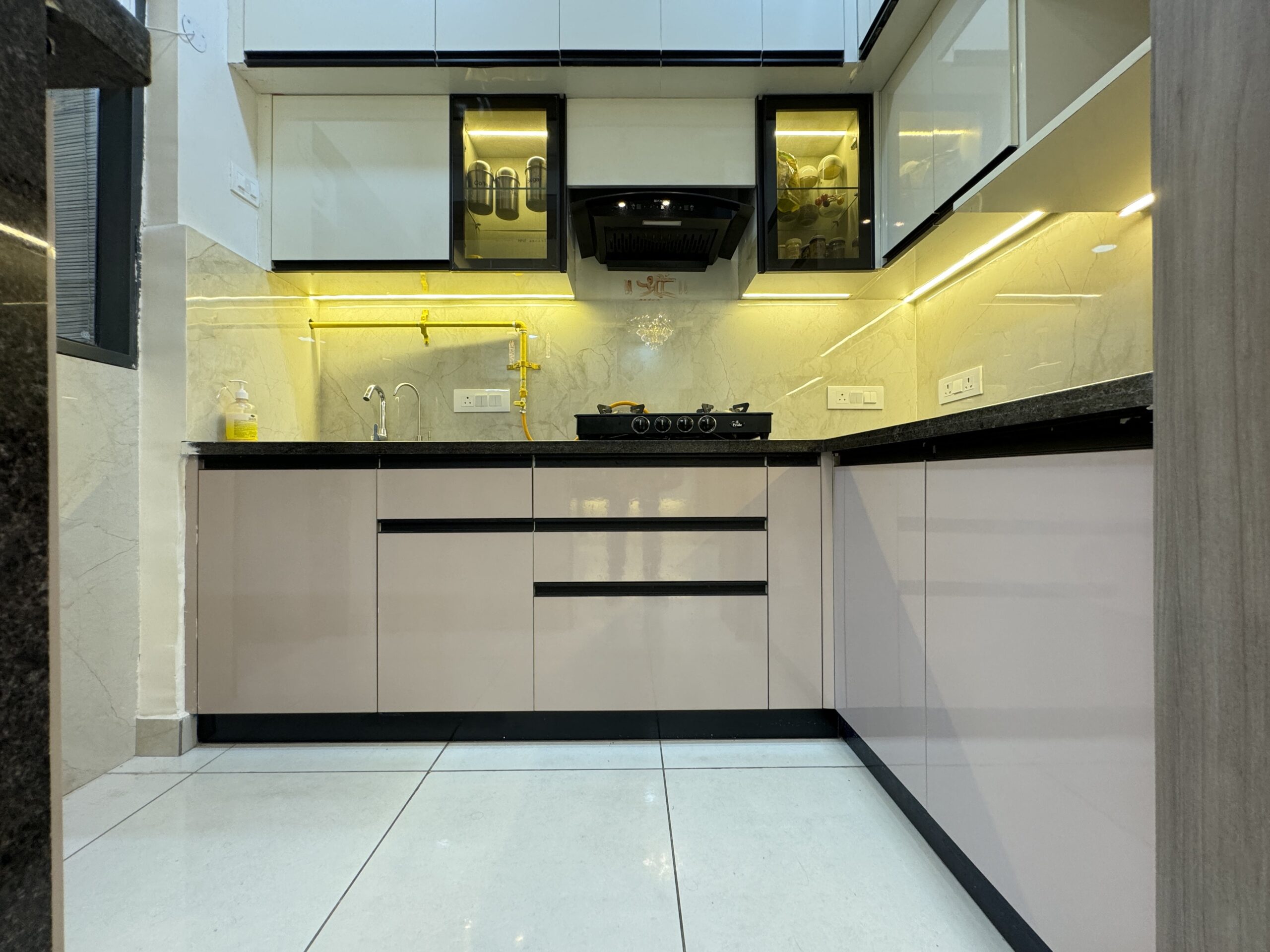 aesthetic modular kitchen interior design in 3BHK home in Greater Noida Coco County 