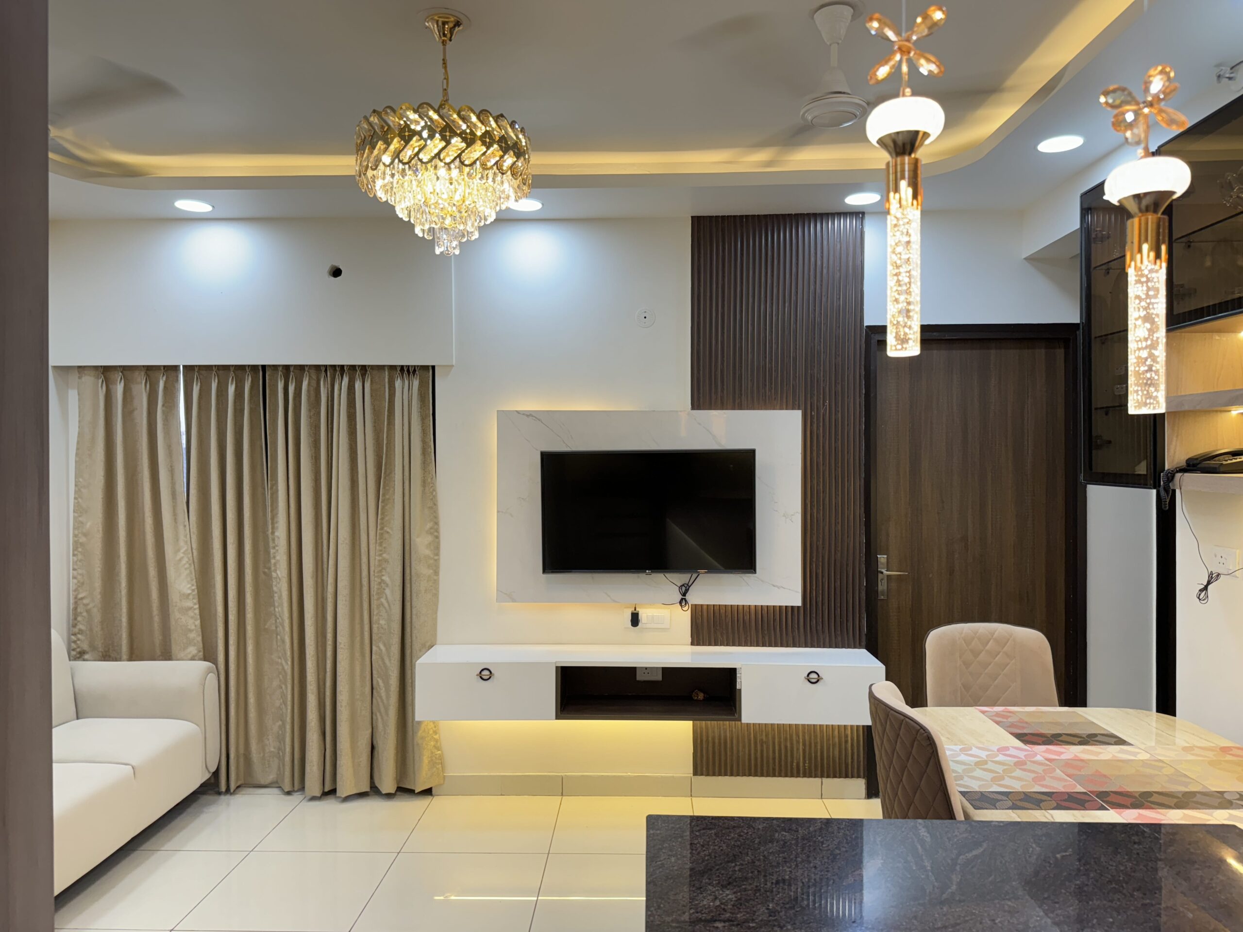 modern chic 3BHK living room interior design for sophisticated living at your home